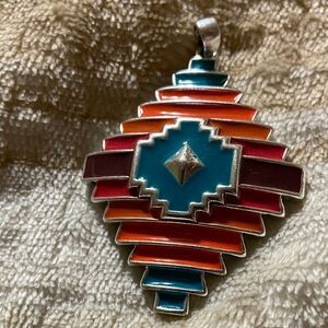 Turquoise coral diamond shape pendant.